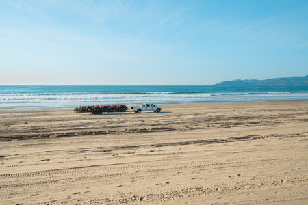 Oceano, California, USA -December 14,  2022.  Cars on the beach. Oceano Dunes, California Central Coast, the only California State Park that allows  vehicles to drive on the beachのeditorial素材
