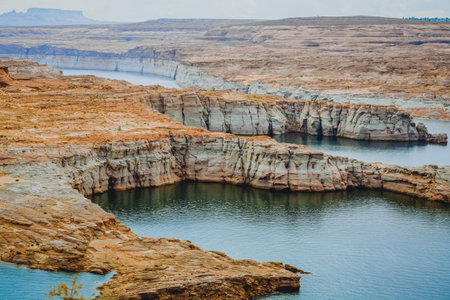 Lake Powell overlook,  Red rocks, cliffs, bluffs, and cloudy sky on backgroundの写真素材