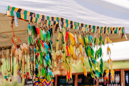 Pow Wow. Details of regalia and decorations. A variety of animal hides and bird feathers are...