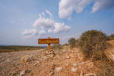 Respect Mother Earth poster in the middle of desert on unpaved road in Arizonaの写真素材