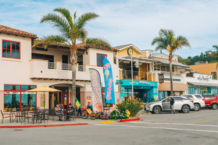 Avila Beach, California, USA - February 2, 2023.  Avila Beach city promenade filled with restaurants, shops, patios, benches, and art.のeditorial素材