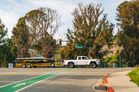 Avila Beach, California, USA - February 2, 2023 Avila Beach road sign, intersection, traffic lights....