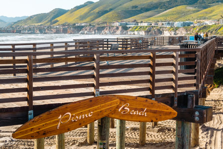 Pismo Beach, California, USA - March 2, 2023.  Pismo Beach pier, and wooden boardwalk in the heart of Pismo Beach city, Californiaのeditorial素材