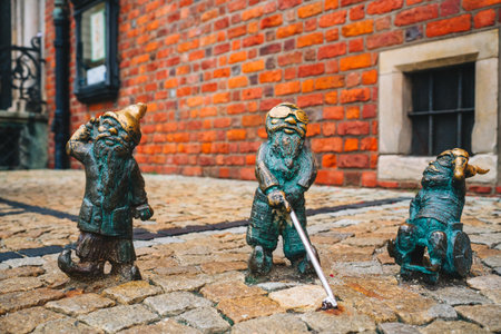The Dwarfs of Wroclaw. Dwarfsculptures lurking and hiding around every corner of the city. Wroclaw, Poland.のeditorial素材