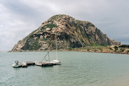 Morro Rock, a volcanic plug in Morro bay, California, on the Pacific Coast at the entrance to Morro Bay harborの写真素材