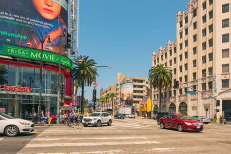 Hollywood, California, USA - April 26, 2023.   Street scene. The intersection of Hollywood Boulevard and Highland Avenue, one of Los Angeles most iconic and hectic intersectionsのeditorial素材