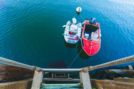 Avila beach, California, USA - June 25, 2023. Boats parked on water close to the pierのeditorial素材