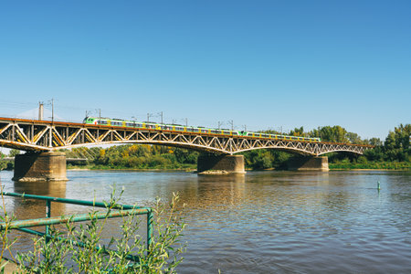 Warsaw, Poland, September 15, 2023 - Swietokrzyski bridge over the Vistula river in Warsaw, Poland in a bright sunny dayのeditorial素材