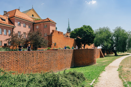 Warsaw, Poland - July 16, 2023. Warsaw Old Town red brick wall on Castle Squareのeditorial素材