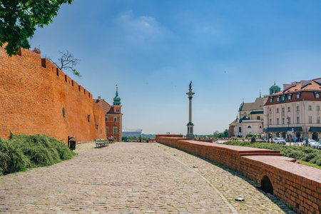 Warsaw, Poland - July 16, 2023. Warsaw Old Town red brick wall, and Sigismund's Column at Castle Squareのeditorial素材