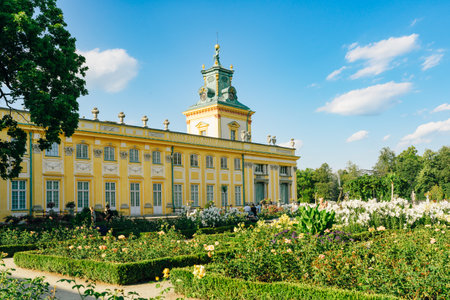 Warsaw, Poland - July 15, 2023. Wilanow Palace in Warsaw, Poland - a baroque royal palace, and beautiful garden with bushes and flowers. Wilanow Royal Palace is located in the WilanÃ³w district.のeditorial素材