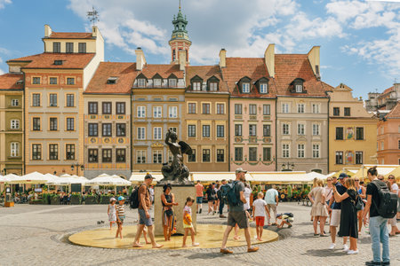 Warsaw, Poland - July 16, 2023. Old Town Market Square with Mermaid Statue - a symbol of the city of Warsaw at the Old Town Market Square, Polandのeditorial素材