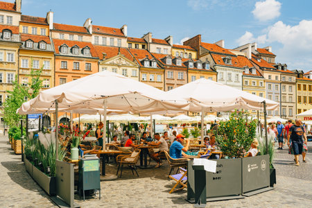 Warsaw, Poland - July 16, 2023. Old Town Market Square in Warsaw is a bustling local gathering place and a symbol of the city's resilienceのeditorial素材