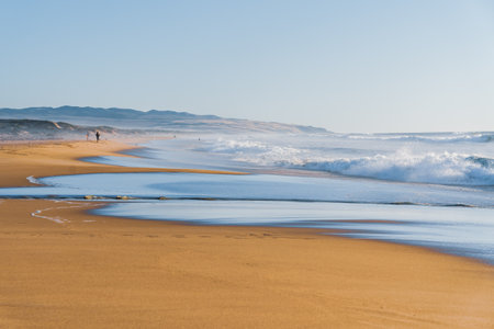 Sea waves, and clear blue sky on a sunlit day, blending tranquility and awe-inspiring nature, Californiaの写真素材
