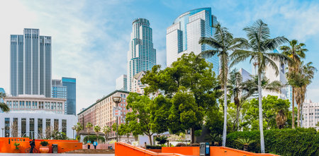 Los Angeles, California, USA - April 25, 2023. Historic Millennium Biltmore Hotel, U.S. Bank Tower, and the Deloitte building or Gas Company Tower, view from Pershing Square, downtown Los Angeles, CAのeditorial素材