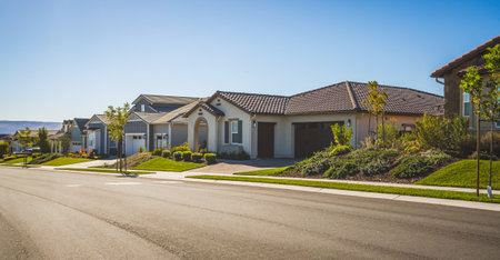 Luxury homes on an empty street in small town somewhere in Californiaの写真素材
