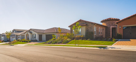 Luxury homes on an empty street in small town somewhere in Californiaの写真素材