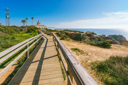 Wooden boardwalk along the cliffs in Lagos, Algarve, Portugalの写真素材