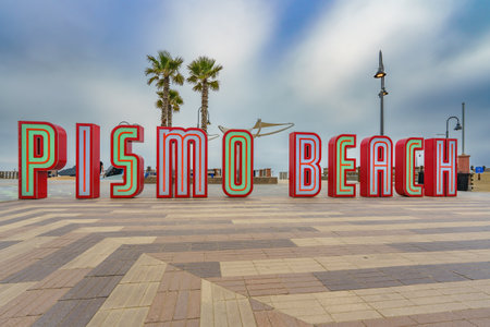 Pismo Beach, California, USA - April 19, 2024. Pismo Beach Pier plaza. The large light-up letters, landmark of Pismo Beach city, Californiaのeditorial素材