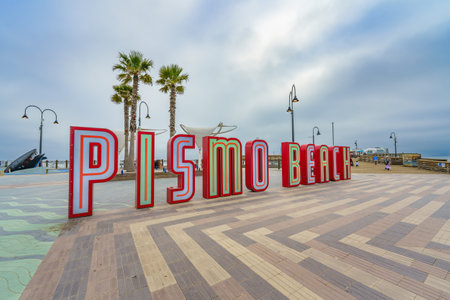 Pismo Beach, California, USA - April 19, 2024. Pismo Beach Pier plaza. The large light-up letters, landmark of Pismo Beach city, Californiaのeditorial素材