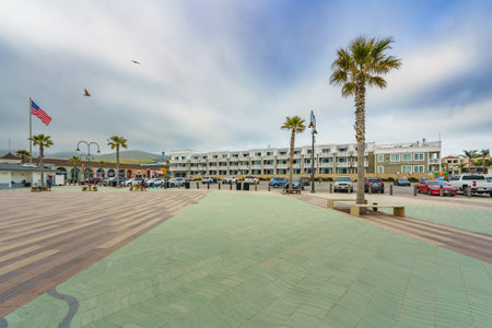 Pismo Beach, California, USA - April 19, 2024. Inn at the Pier hotel, parking lot, and Pismo Beach Plaza.のeditorial素材