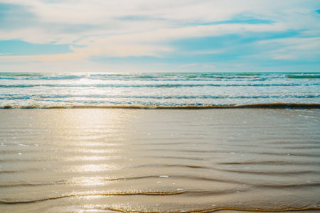 Beautiful blue sea, beach sand, and smooth blue sky in a sunny day in California. Relaxation, tourism, vacations, Summer conceptの写真素材