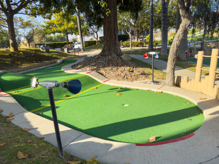 Colorful mini-golf course features various holes and playful challenges.の写真素材