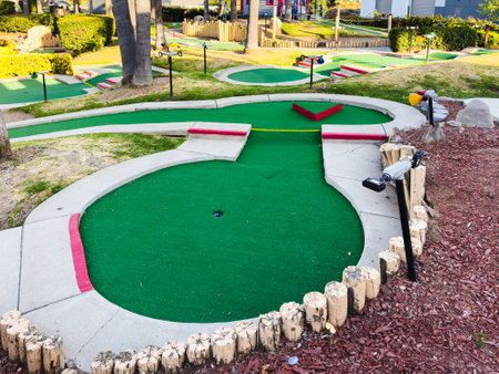 Colorful mini-golf course features various holes and playful challenges.の写真素材