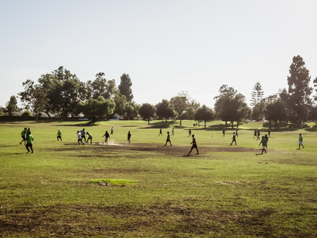 Santa Maria, California, USA - July 20, 2024. Soccer game in progress on a sunny day in the park.のeditorial素材