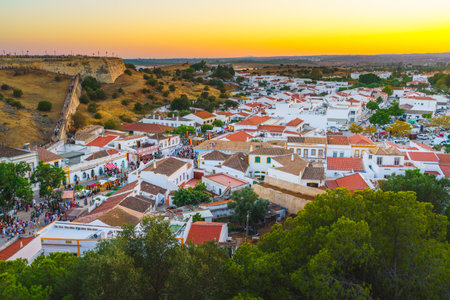 Celebration of medieval heritage with lively crowds and festive decorations in Castro Marim.の写真素材