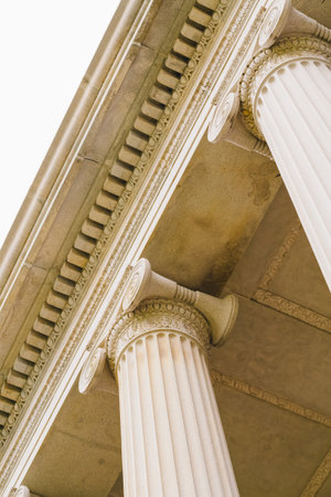 Elegant Corinthian columns and intricate stonework define the grand facade of the U.S. Treasury...