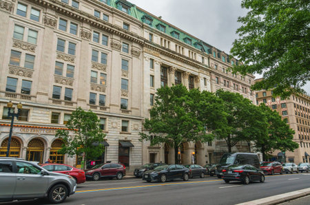 Washington D.C., USA - May 21, 2025. Busy urban street lined with historic buildings and the iconic Old Ebbitt Grill.のeditorial素材