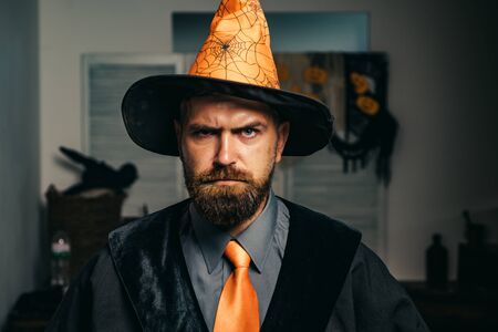 Halloween. Bearded man. Father plays wizard. Fantasy. Autumn. Halloween party. 31 october. Magic hatの写真素材