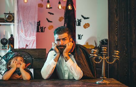 Father and son. Parenting. Different generations. Family celebrates halloween.の写真素材