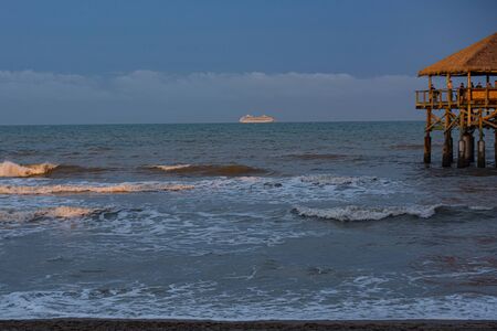 Golden waves on the Atlantic ocean. Beautiful sunset on the ocean.の写真素材