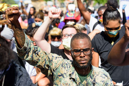 Miami Downtown, FL, USA - MAY 31, 2020: Black and white people protest in the USA.のeditorial素材