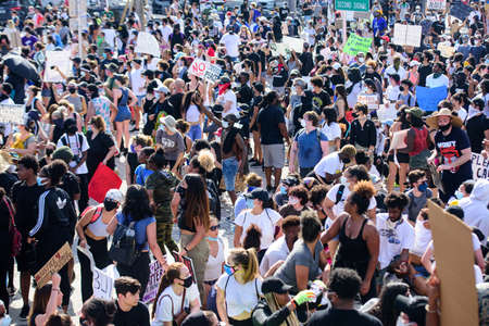 Miami Downtown, FL, USA - MAY 31, 2020: Protesters took to the streets in cities across the U.S. after a white police officer was charged with the murder of an unarmed black man.のeditorial素材