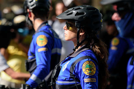 Miami Downtown, FL, USA - MAY 31, 2020: US patrol police. Female police officer.のeditorial素材