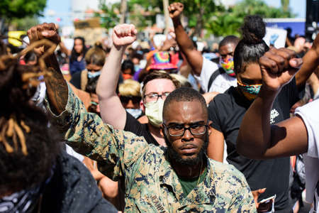 Miami Downtown, FL, USA - MAY 31, 2020: Emotional anti racism demonstrations. Protests in the United States.のeditorial素材