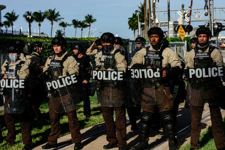 Miami Downtown, FL, USA - MAY 31, 2020 American police officers. White and black people together, colleagues.のeditorial素材