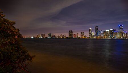 Night ocean near Miami. Miami, Florida skyline and bay at sunset seen. View of Miami at sunset, USA.の写真素材