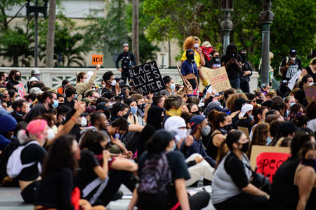 Miami Downtown, FL, USA - JUNE 12, 2020: Black Lives Matter. Many american people went to peaceful protests in the US against the George Floyd death: people are protesting. White and black togetherのeditorial素材