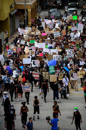 Miami Downtown, FL, USA - JUNE 12, 2020: Black Lives Matter. Miami-area police and protesters.The protests have spread to cities across the United States. Miami protest live. Police and protestersのeditorial素材
