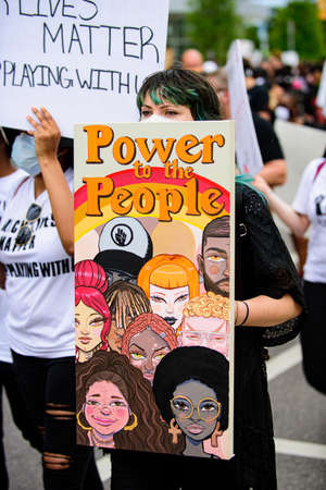 Orlando, FL, USA - JUNE 19, 2020: Thousands of people on US streets take part in demonstrations against racism.のeditorial素材