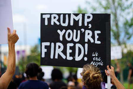 Orlando, FL, USA - JUNE 19, 2020: Trump, youre fired poster. Demonstration in the USA. Voters and...