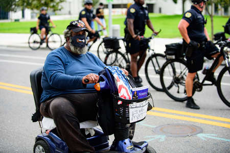 Orlando, FL, USA - JUNE 19, 2020: Disabled man at the protest Black Lives Matter.のeditorial素材