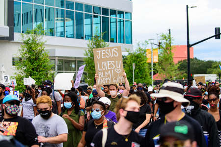 Orlando, FL, USA - JUNE 19, 2020: Jesus loves you poster. Demonstrations in the USAのeditorial素材