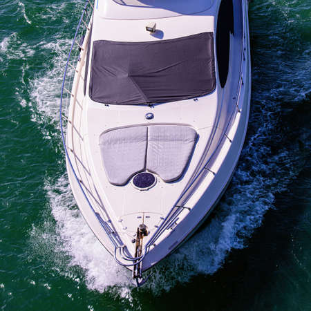 Yacht with sun protection on the window. Beautiful ocean vacation.の写真素材