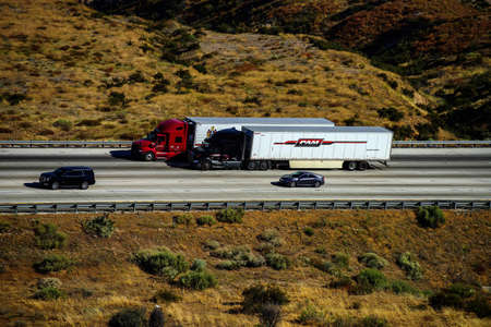 Arizona, USA - May, 2020: Beautiful trucks on the road in the middle of the Arizona desert in the United States.の写真素材