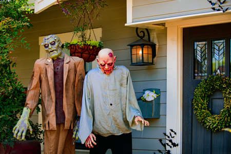 Zombie monsters. Pumpkin and Halloween scenery. Terrible holiday at home. Halloween in the USA. Traditions and house decor. Terrible creatures.の写真素材